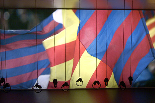 Camp Nou Experience : Headsets with FC Barcelona and Catalan flags in background